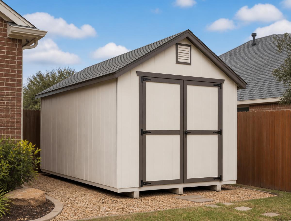 Portable storage building with double doors beside a Texas home